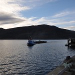 Barge towed into harbour